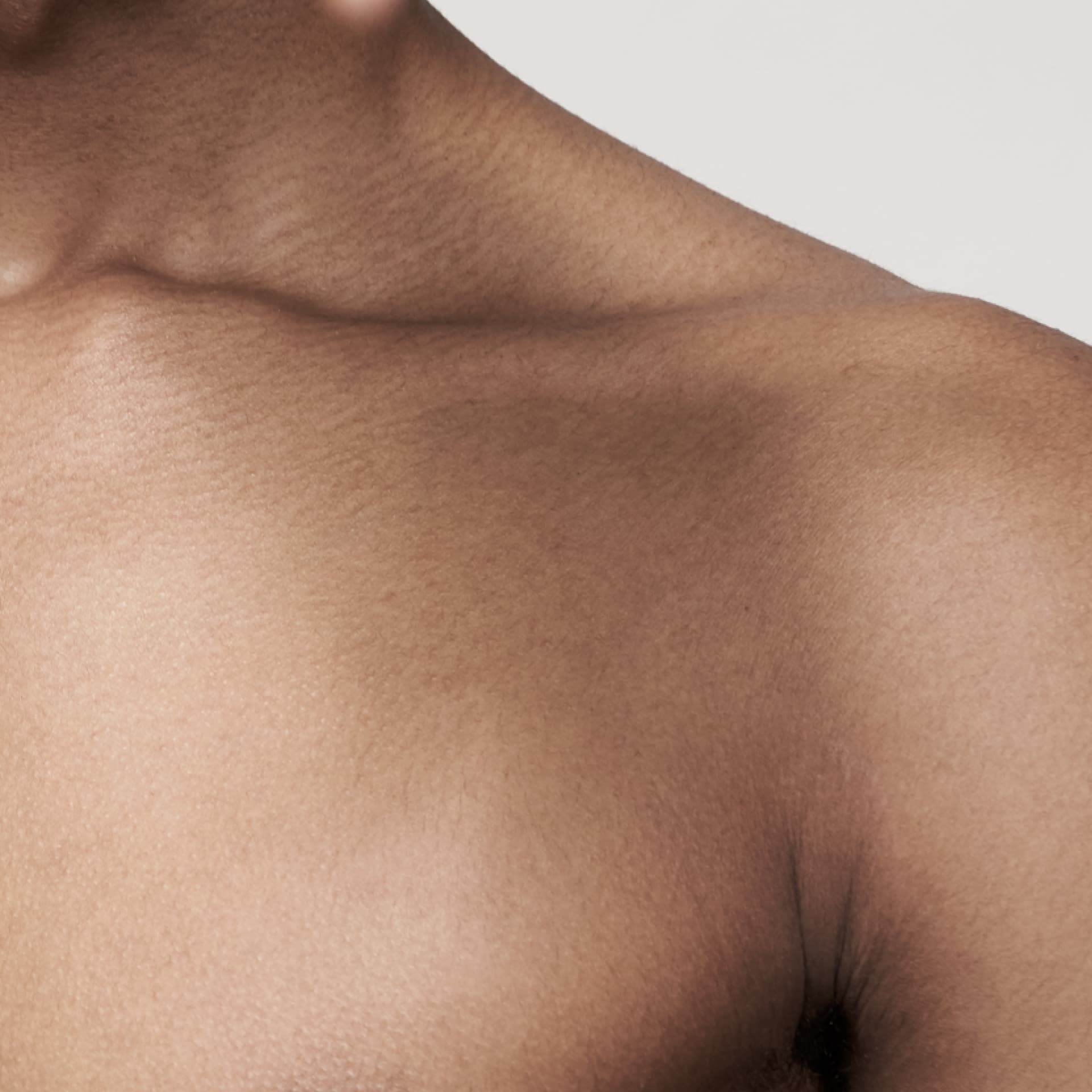 Close-up macro of human skin on the shoulder and collarbone
